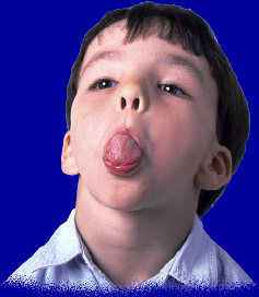 boy sticking out tongue